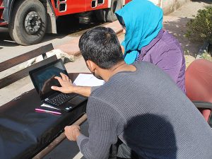Beneficiary using the Portable Health Information Kiosk to identify the risk factors associated with his health condition